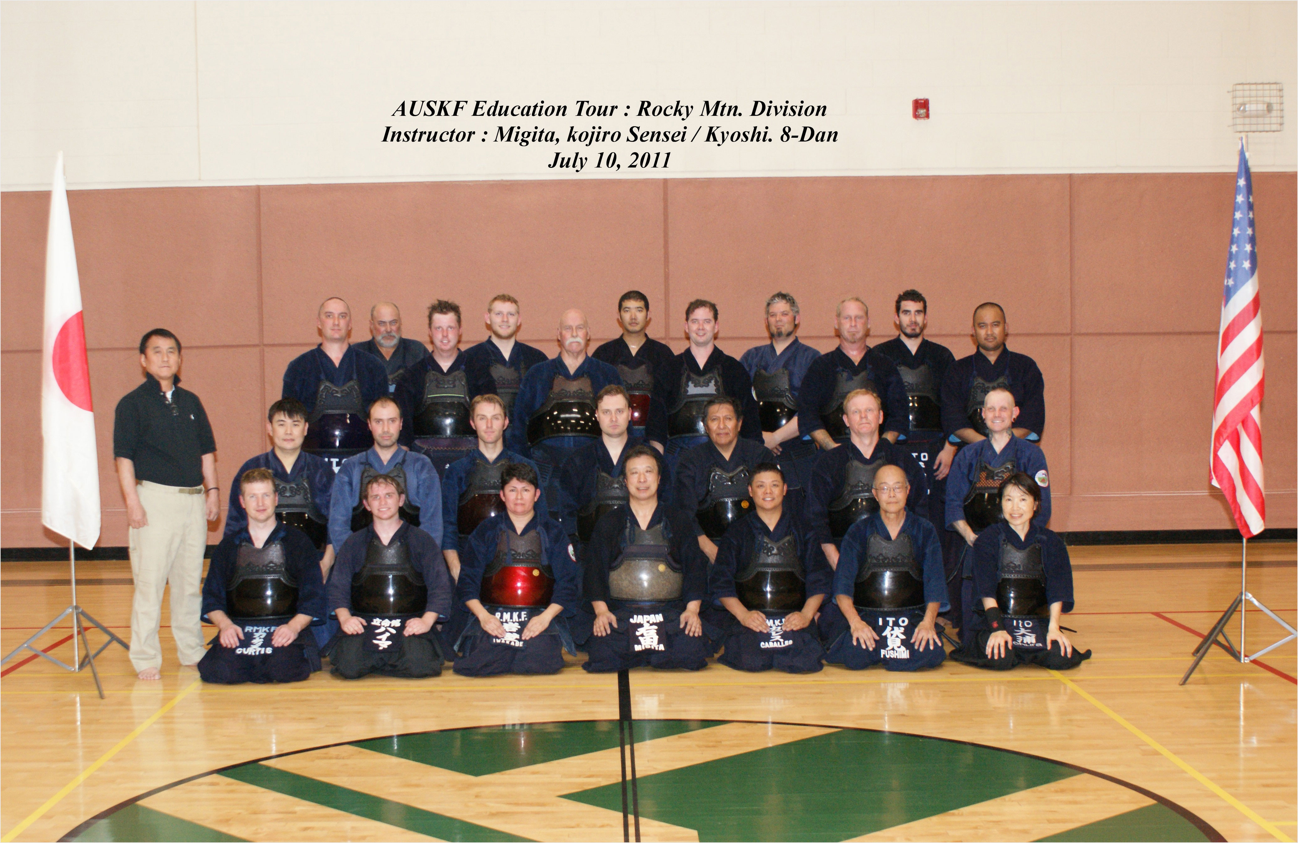 Kendo students in traditional armor with both American and Japanese flags — the cultural bridge